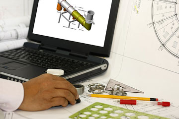 a draftsman using a computer aided design system